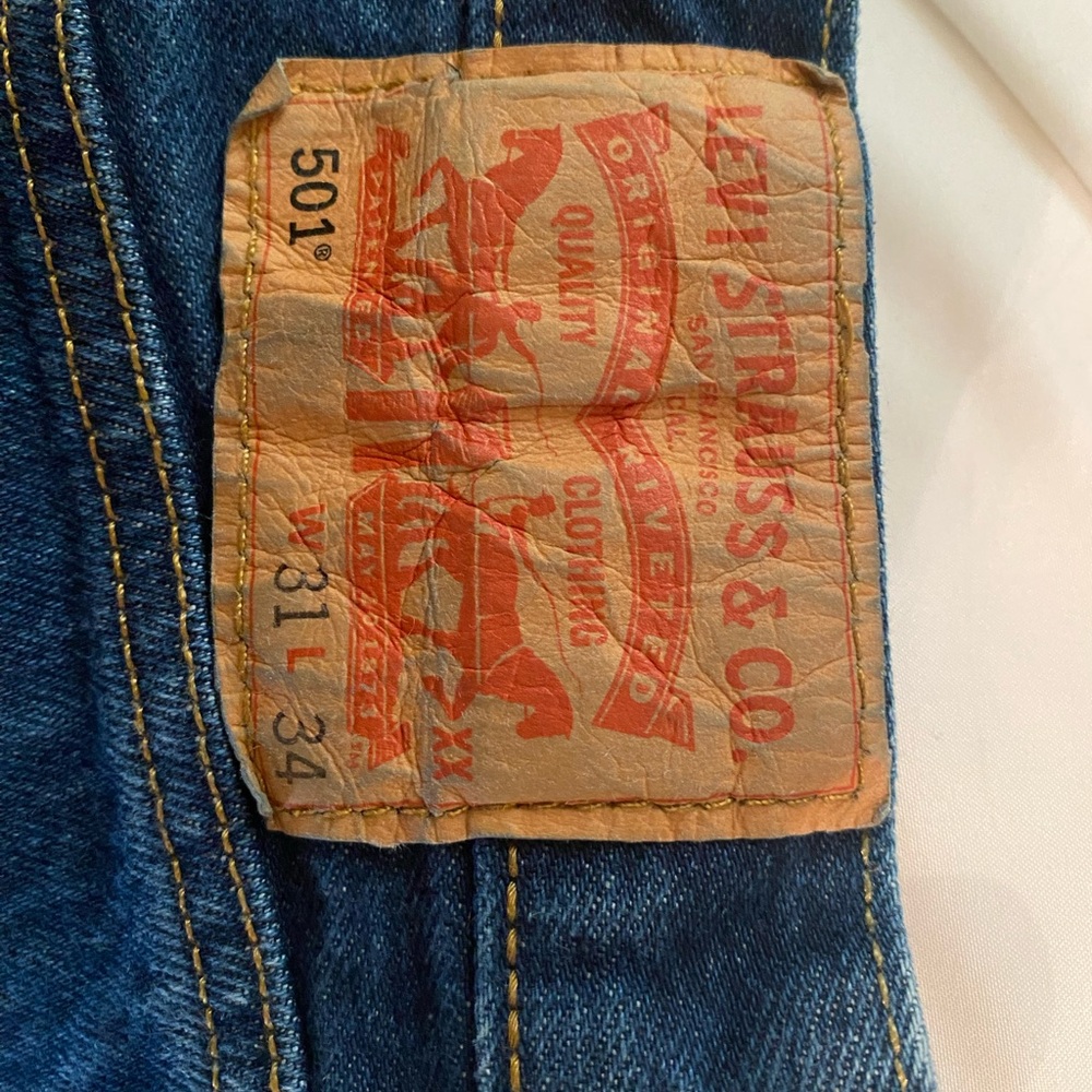 Levi's Dark Blue Straight-Leg Jeans with Tan Patch - Picture 1 of 3